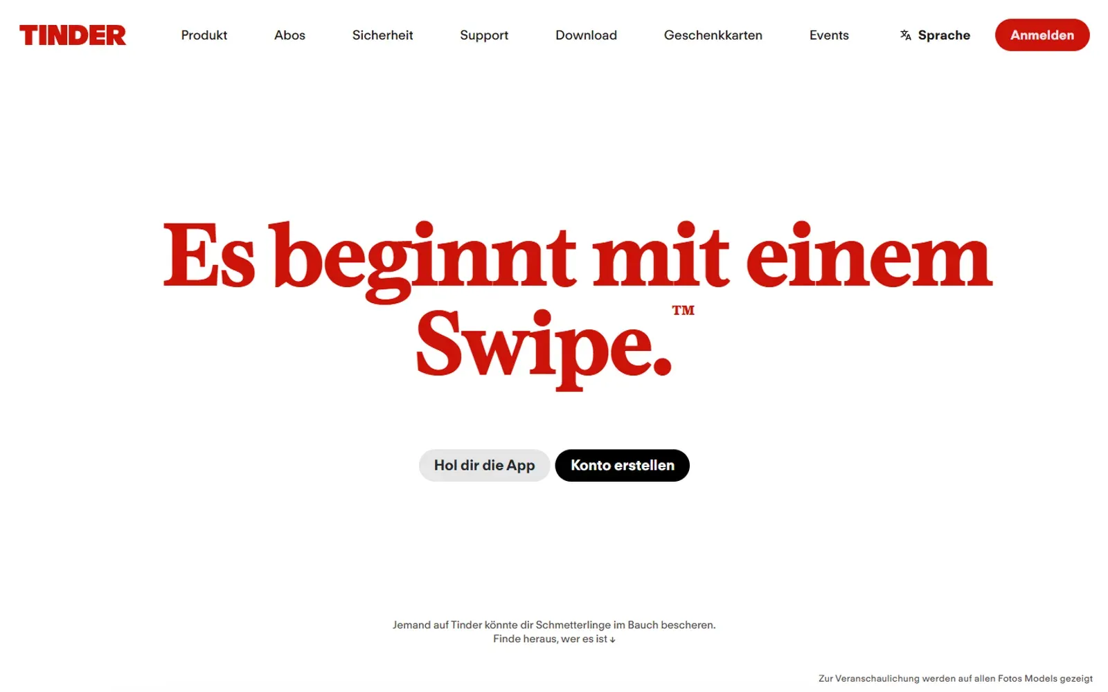 Startseite von Tinder mit dem Slogan „Es beginnt mit einem Swipe“